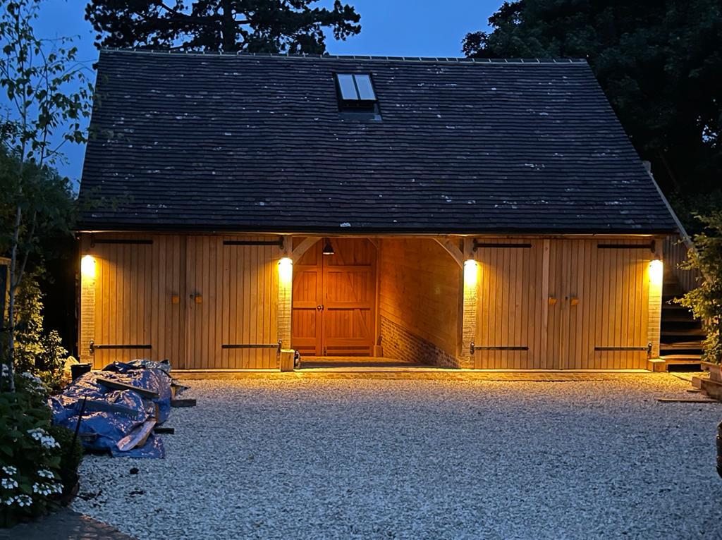 Bespoke oak framed garage with lighting in Sussex